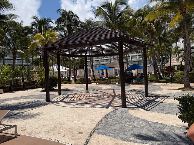 Open-air gazebo and surrounding resort grounds
